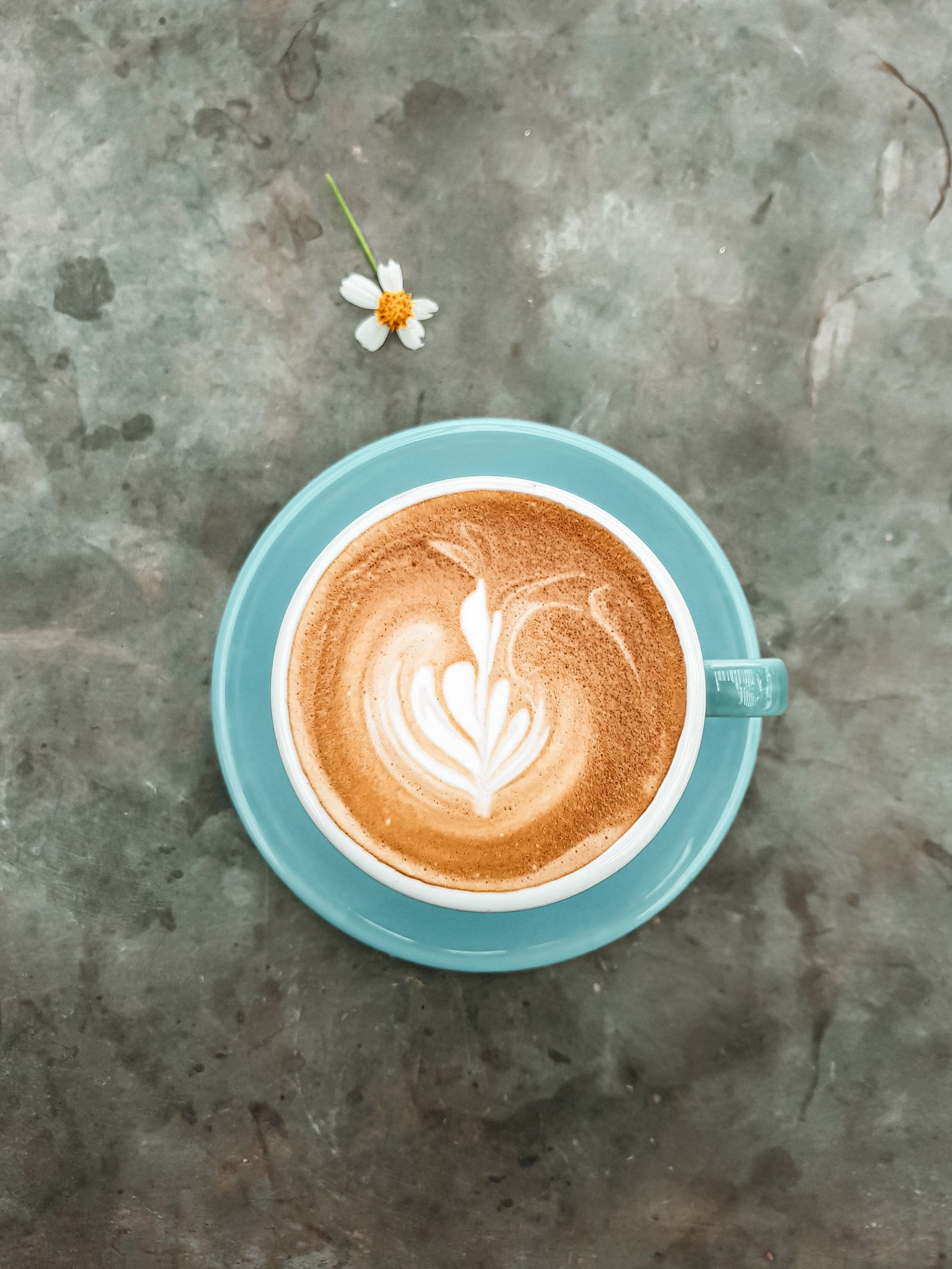 Latte art on a wooden tray